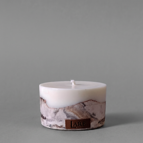 Minimalist brown marble look concrete soy candle with a natural cotton wick