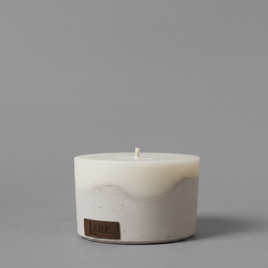 Highly scented oval beige cement soy candle, coated with nano